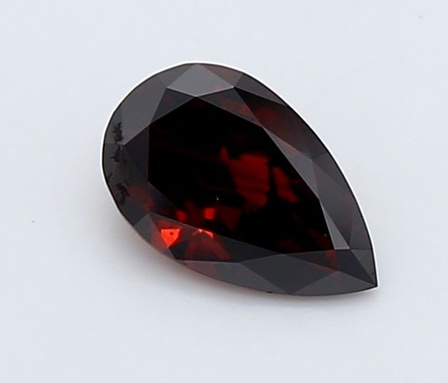 Loose Diamond - PEAR 0.51ct Fancy Deep Orange SI2: Loose Diamond - PEAR 0.51ct Fancy Deep Orange SI2 Source: This is a real non-mined Diamond that has been grown in a lab Shape: PEAR Carats: 0.51 Color: Fancy Deep Orange Certification: IGI Video: