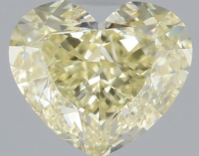 Loose Diamond - HEART 1.04ct Fancy Light Yellow VS1: Loose Diamond - HEART 1.04ct Fancy Light Yellow VS1 Source: This is a real non-mined Diamond that has been grown in a lab Shape: HEART Carats: 1.04 Color: Fancy Light Yellow Certification: IGI Video: