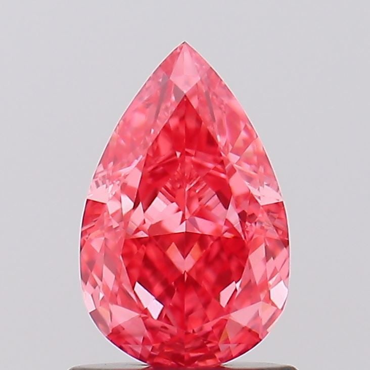Loose Diamond - PEAR 1.07ct Fancy Vivid Pink VVS2: Loose Diamond - PEAR 1.07ct Fancy Vivid Pink VVS2 Source: This is a real non-mined Diamond that has been grown in a lab Shape: PEAR Carats: 1.07 Color: Fancy Vivid Pink Certification: IGI Video: