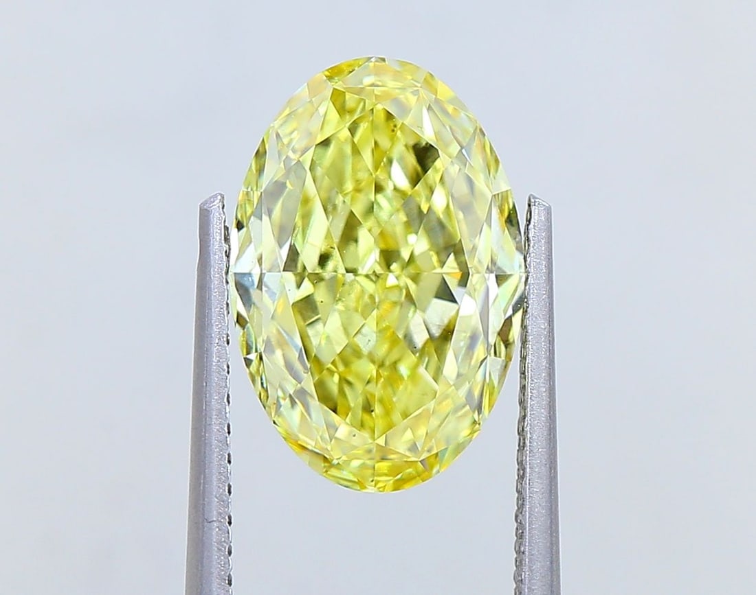 Loose Diamond - OVAL 3.52ct Fancy Intense Yellow VS2: Loose Diamond - OVAL 3.52ct Fancy Intense Yellow VS2 Source: This is a real non-mined Diamond that has been grown in a lab Shape: OVAL Carats: 3.52 Color: Fancy Intense Yellow Certification: IGI Video