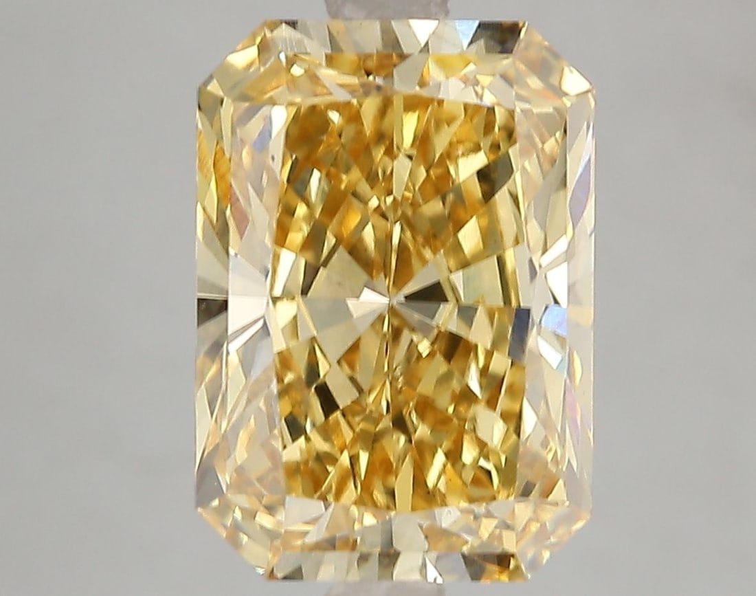 Loose Diamond - RADIANT 5.08ct Fancy Vivid Yellow VS2: Loose Diamond - RADIANT 5.08ct Fancy Vivid Yellow VS2 Source: This is a real non-mined Diamond that has been grown in a lab Shape: RADIANT Carats: 5.08 Color: Fancy Vivid Yellow Certification: IGI Vid