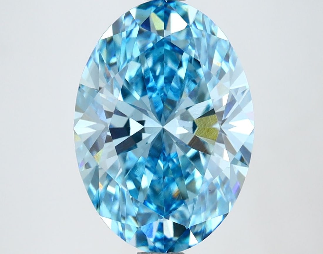 Loose Diamond - OVAL 3.28ct Fancy Vivid Blue VVS2: Loose Diamond - OVAL 3.28ct Fancy Vivid Blue VVS2 Source: This is a real non-mined Diamond that has been grown in a lab Shape: OVAL Carats: 3.28 Color: Fancy Vivid Blue Certification: IGI Video: