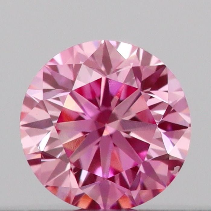 Loose Diamond - ROUND 0.14ct Fancy Vivid Pink VS2: Loose Diamond - ROUND 0.14ct Fancy Vivid Pink VS2 Source: This is a real non-mined Diamond that has been grown in a lab Shape: ROUND Carats: 0.14 Color: Fancy Vivid Pink Certification: IGI Video: