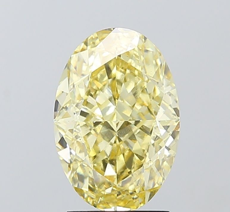 Loose Diamond - OVAL 3.05ct Fancy Yellow VS2: Loose Diamond - OVAL 3.05ct Fancy Yellow VS2 Source: This is a real non-mined Diamond that has been grown in a lab Shape: OVAL Carats: 3.05 Color: Fancy Yellow Certification: IGI Video: