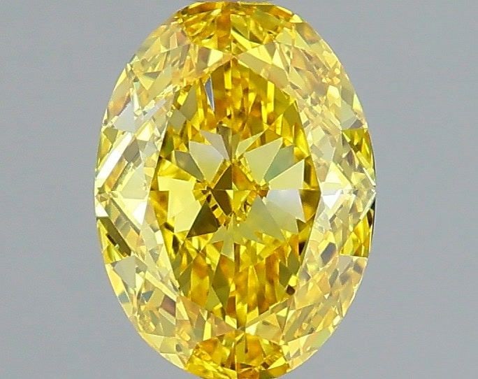 Loose Diamond - OVAL 1.01ct Fancy Vivid Yellow VVS2: Loose Diamond - OVAL 1.01ct Fancy Vivid Yellow VVS2 Source: This is a real non-mined Diamond that has been grown in a lab Shape: OVAL Carats: 1.01 Color: Fancy Vivid Yellow Certification: IGI Video: