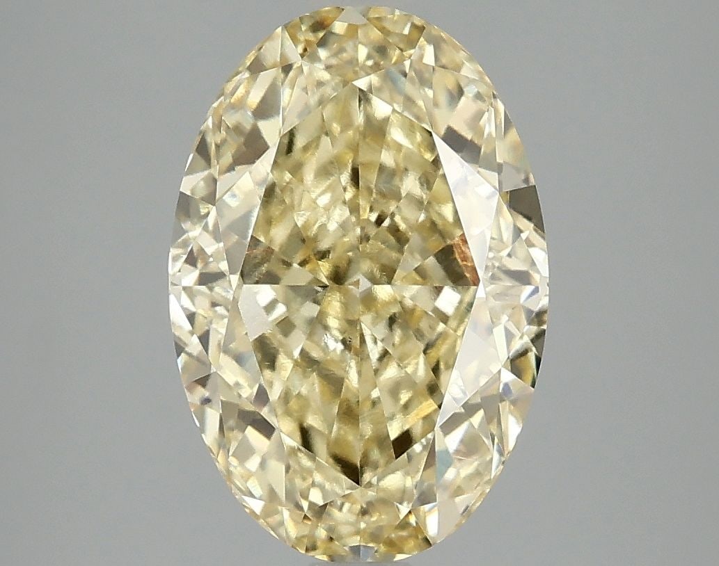 Loose Diamond - OVAL 4.07ct Fancy Vivid Yellow VS1: Loose Diamond - OVAL 4.07ct Fancy Vivid Yellow VS1 Source: This is a real non-mined Diamond that has been grown in a lab Shape: OVAL Carats: 4.07 Color: Fancy Vivid Yellow Certification: IGI Video: