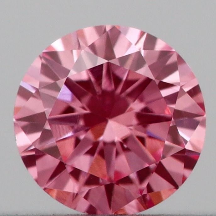 Loose Diamond - ROUND 0.16ct Fancy Vivid Pink VS1: Loose Diamond - ROUND 0.16ct Fancy Vivid Pink VS1 Source: This is a real non-mined Diamond that has been grown in a lab Shape: ROUND Carats: 0.16 Color: Fancy Vivid Pink Certification: IGI Video: