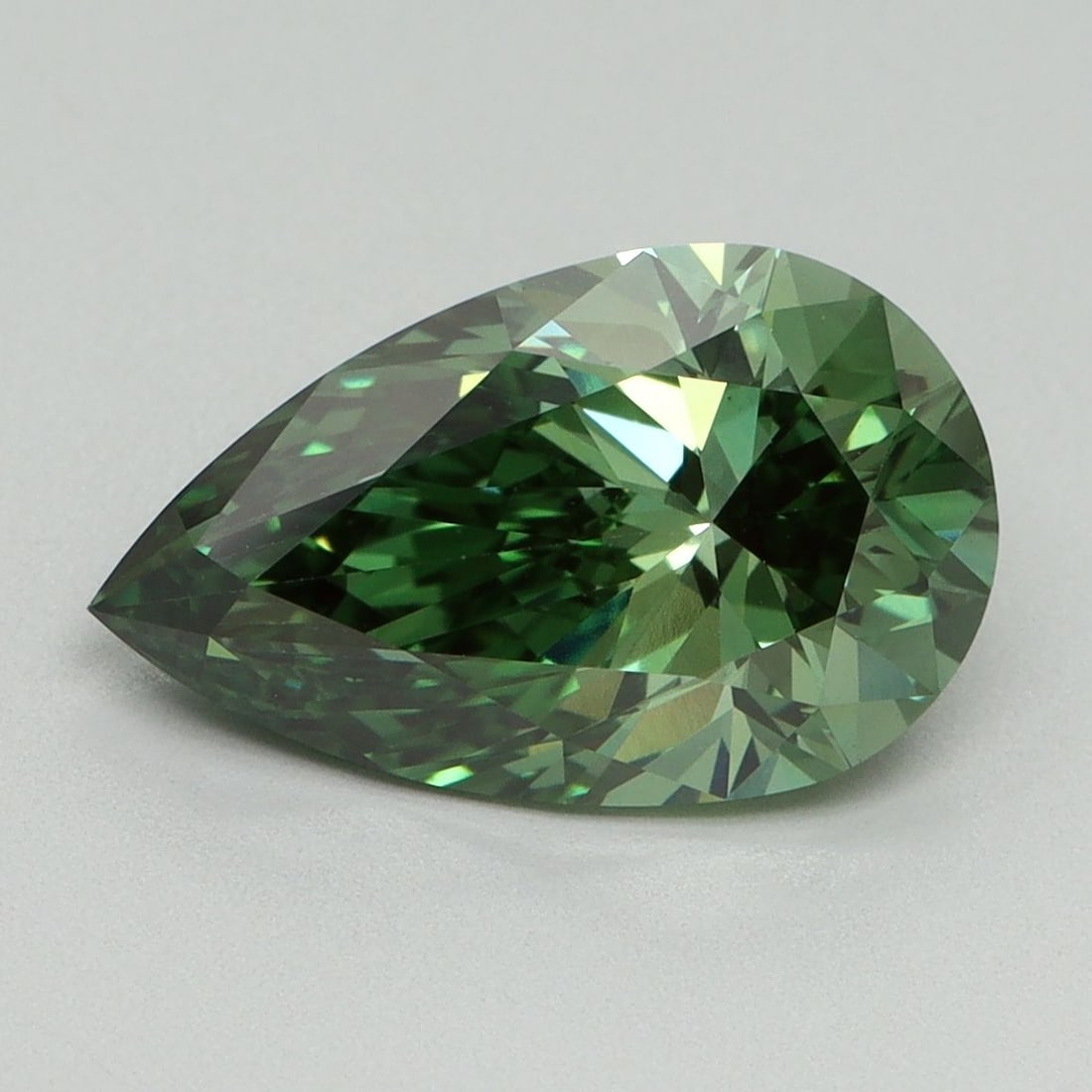 Loose Diamond - PEAR 3.09ct Fancy Vivid Green VS1: Loose Diamond - PEAR 3.09ct Fancy Vivid Green VS1 Source: This is a real non-mined Diamond that has been grown in a lab Shape: PEAR Carats: 3.09 Color: Fancy Vivid Green Certification: IGI Video: