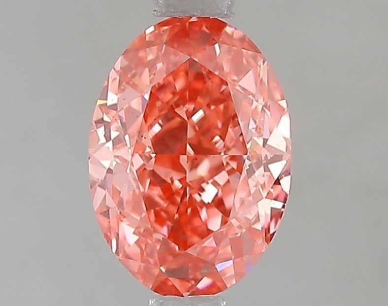 Loose Diamond - OVAL 1.52ct Fancy Vivid Pink VS2: Loose Diamond - OVAL 1.52ct Fancy Vivid Pink VS2 Source: This is a real non-mined Diamond that has been grown in a lab Shape: OVAL Carats: 1.52 Color: Fancy Vivid Pink Certification: IGI Video: