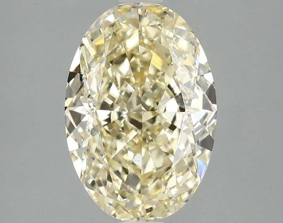 Loose Diamond - OVAL 3.1ct Fancy Intense Yellow VS1: Loose Diamond - OVAL 3.1ct Fancy Intense Yellow VS1 Source: This is a real non-mined Diamond that has been grown in a lab Shape: OVAL Carats: 3.1 Color: Fancy Intense Yellow Certification: IGI Video: