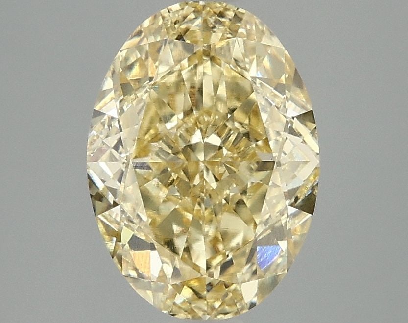 Loose Diamond - OVAL 2.87ct Fancy Vivid Yellow VS1: Loose Diamond - OVAL 2.87ct Fancy Vivid Yellow VS1 Source: This is a real non-mined Diamond that has been grown in a lab Shape: OVAL Carats: 2.87 Color: Fancy Vivid Yellow Certification: IGI Video:
