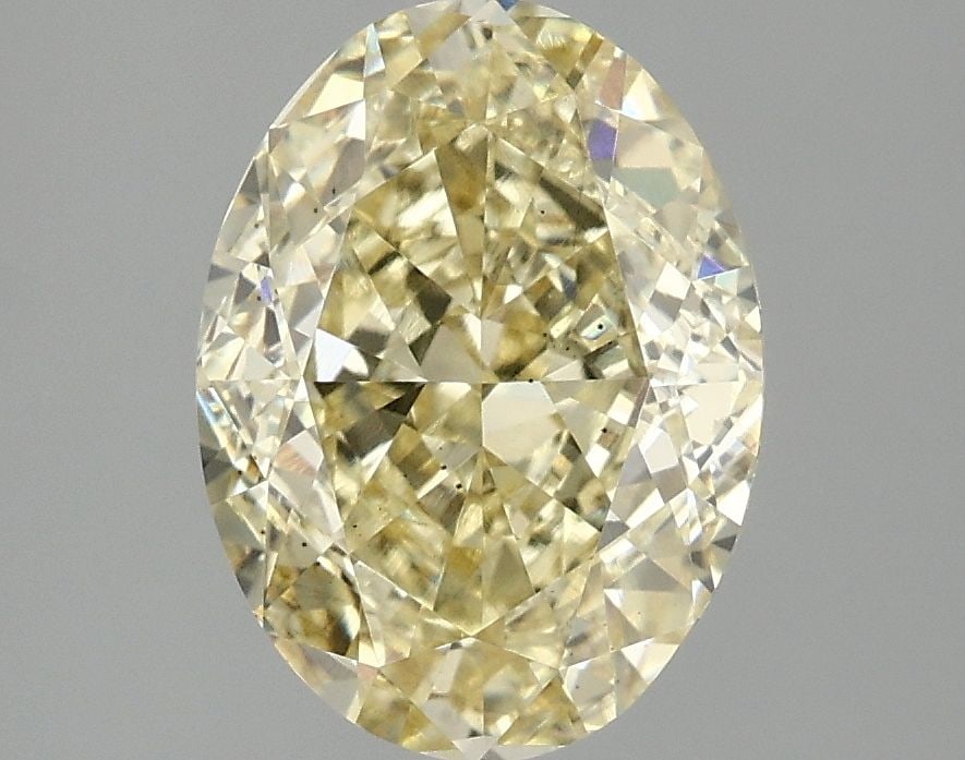 Loose Diamond - OVAL 3.02ct Fancy Intense Yellow SI1: Loose Diamond - OVAL 3.02ct Fancy Intense Yellow SI1 Source: This is a real non-mined Diamond that has been grown in a lab Shape: OVAL Carats: 3.02 Color: Fancy Intense Yellow Certification: IGI Video