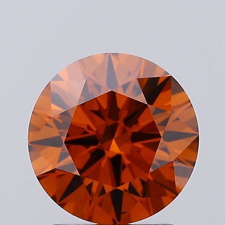 Ideal Loose Diamond - ROUND 2.0ct Fancy Vivid Orange VS2: Ideal Loose Diamond - ROUND 2.0ct Fancy Vivid Orange VS2 Source: This is a real non-mined Diamond that has been grown in a lab Shape: ROUND Carats: 2.0 Color: Fancy Vivid Orange Certification: IGI Vid