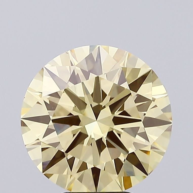 Ideal Loose Diamond - ROUND 3.01ct Fancy Yellow VS1: Ideal Loose Diamond - ROUND 3.01ct Fancy Yellow VS1 Source: This is a real non-mined Diamond that has been grown in a lab Shape: ROUND Carats: 3.01 Color: Fancy Yellow Certification: IGI Video: