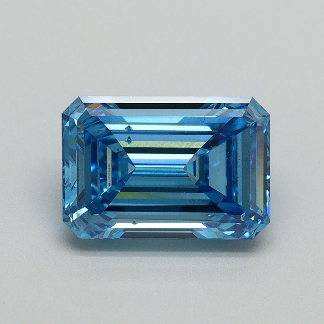 Loose Diamond - EMERALD 2.01ct Fancy Vivid Blue VS2: Loose Diamond - EMERALD 2.01ct Fancy Vivid Blue VS2 Source: This is a real non-mined Diamond that has been grown in a lab Shape: EMERALD Carats: 2.01 Color: Fancy Vivid Blue Certification: IGI Video: