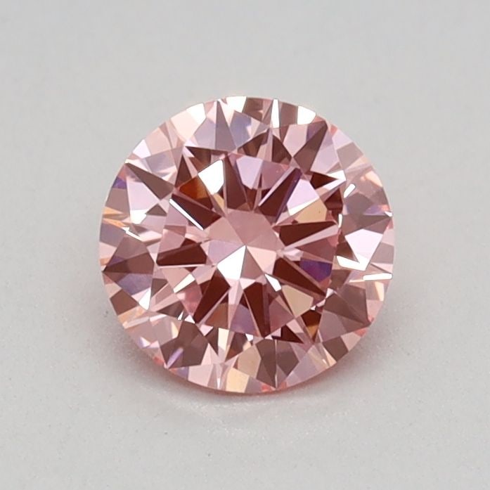 Loose Diamond - ROUND 0.45ct Fancy Vivid Pink VVS2: Loose Diamond - ROUND 0.45ct Fancy Vivid Pink VVS2 Source: This is a real non-mined Diamond that has been grown in a lab Shape: ROUND Carats: 0.45 Color: Fancy Vivid Pink Certification: IGI Video: