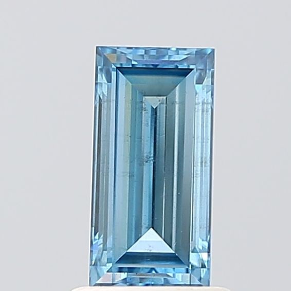 Loose Diamond - BAGUETTE 0.97ct Fancy Vivid Blue VS2: Loose Diamond - BAGUETTE 0.97ct Fancy Vivid Blue VS2 Source: This is a real non-mined Diamond that has been grown in a lab Shape: BAGUETTE Carats: 0.97 Color: Fancy Vivid Blue Certification: IGI Video
