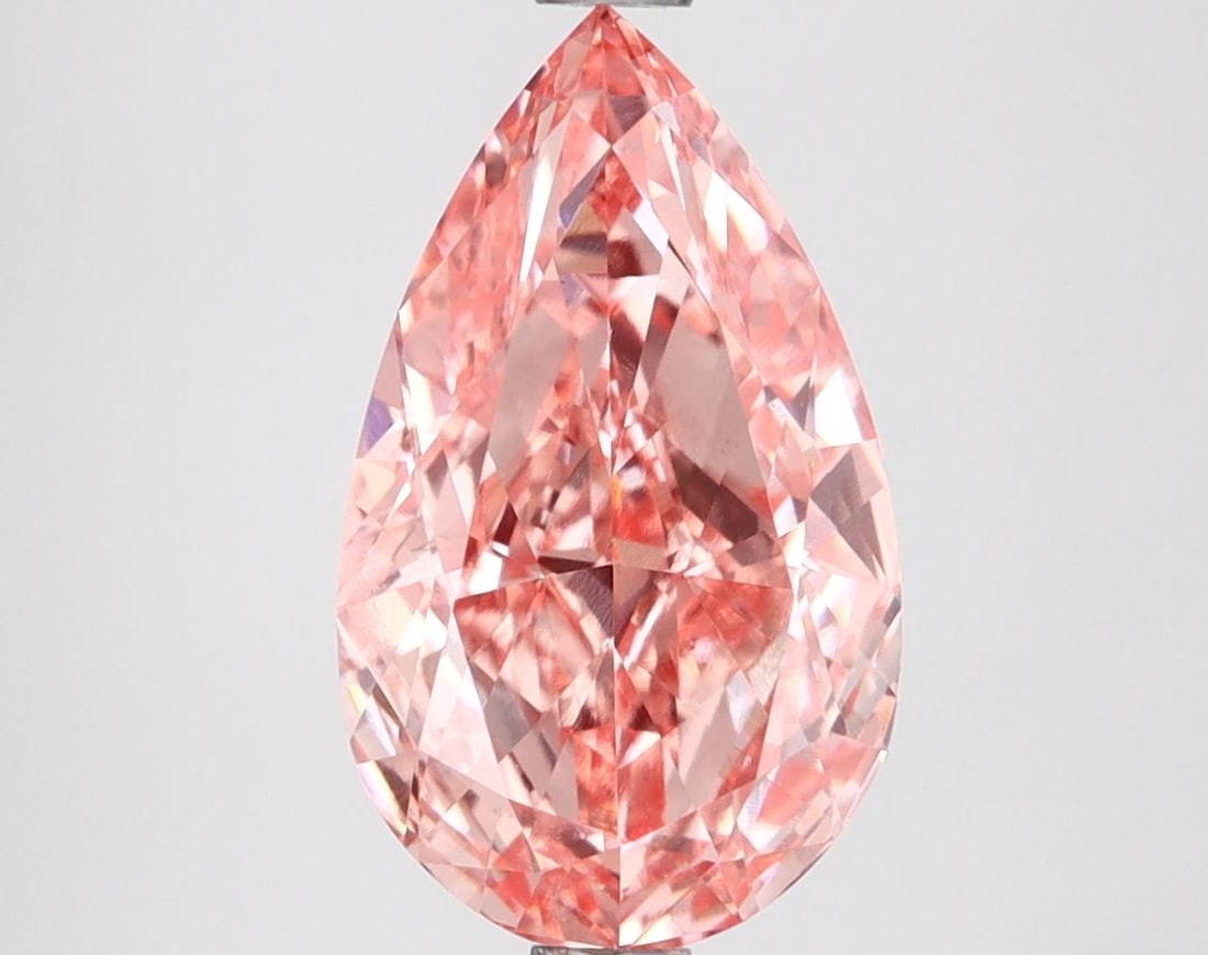 Loose Diamond - PEAR 3.09ct Fancy Vivid Pink VS1: Loose Diamond - PEAR 3.09ct Fancy Vivid Pink VS1 Source: This is a real non-mined Diamond that has been grown in a lab Shape: PEAR Carats: 3.09 Color: Fancy Vivid Pink Certification: IGI Video: