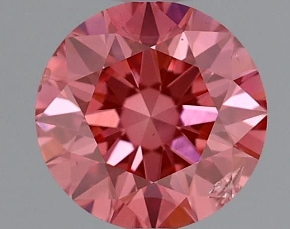 Loose Diamond - ROUND 0.5ct Fancy Vivid Pink SI2: Loose Diamond - ROUND 0.5ct Fancy Vivid Pink SI2 Source: This is a real non-mined Diamond that has been grown in a lab Shape: ROUND Carats: 0.5 Color: Fancy Vivid Pink Certification: IGI Video: