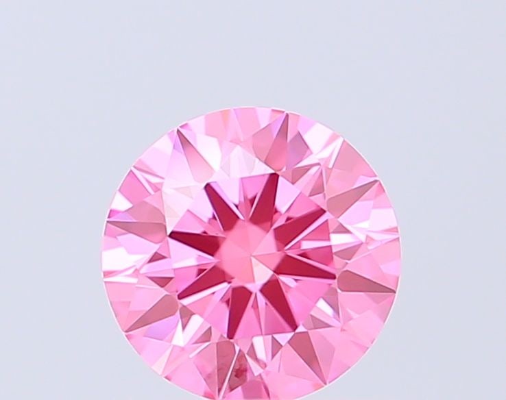 Ideal Loose Diamond - ROUND 0.53ct Fancy Vivid Pink VVS2: Ideal Loose Diamond - ROUND 0.53ct Fancy Vivid Pink VVS2 Source: This is a real non-mined Diamond that has been grown in a lab Shape: ROUND Carats: 0.53 Color: Fancy Vivid Pink Certification: IGI Vide