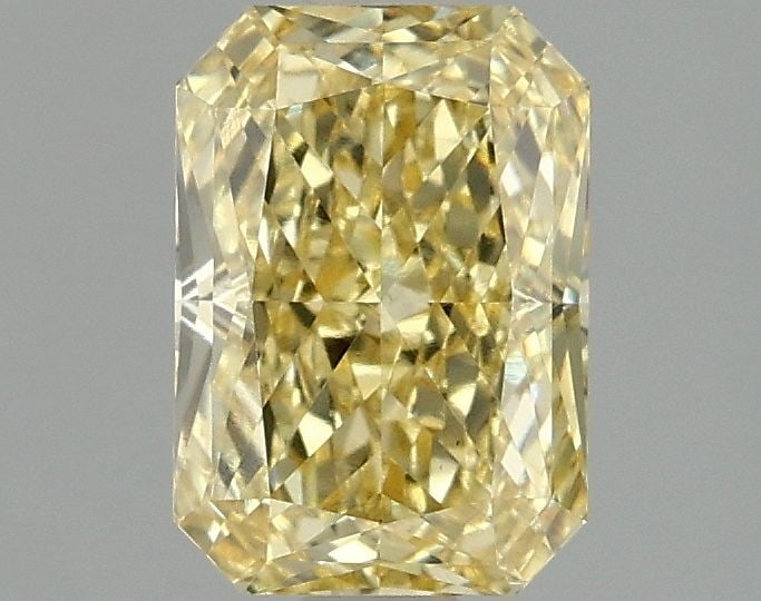 Loose Diamond - RADIANT 1.56ct Fancy Vivid Yellow VS1: Loose Diamond - RADIANT 1.56ct Fancy Vivid Yellow VS1 Source: This is a real non-mined Diamond that has been grown in a lab Shape: RADIANT Carats: 1.56 Color: Fancy Vivid Yellow Certification: IGI Vid
