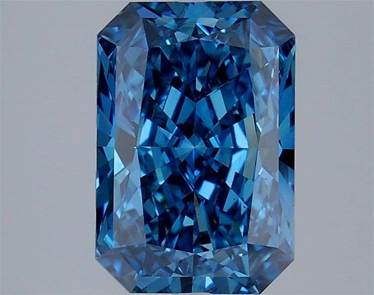 Loose Diamond - RADIANT 3.09ct Fancy Vivid Blue VS2: Loose Diamond - RADIANT 3.09ct Fancy Vivid Blue VS2 Source: This is a real non-mined Diamond that has been grown in a lab Shape: RADIANT Carats: 3.09 Color: Fancy Vivid Blue Certification: IGI Video: