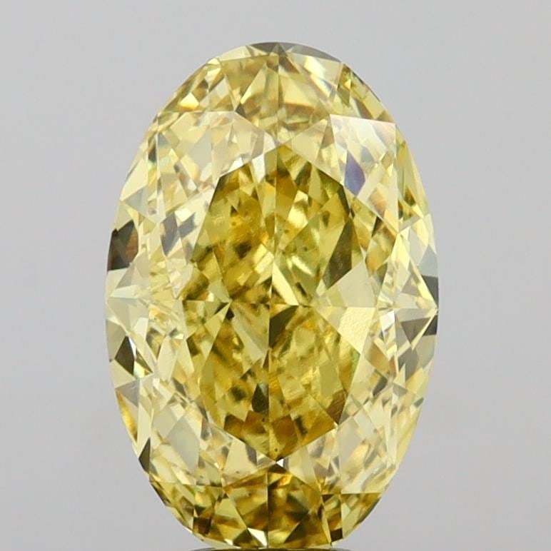 Loose Diamond - OVAL 6.91ct Fancy Intense Yellow VS2: Loose Diamond - OVAL 6.91ct Fancy Intense Yellow VS2 Source: This is a real non-mined Diamond that has been grown in a lab Shape: OVAL Carats: 6.91 Color: Fancy Intense Yellow Certification: IGI Video