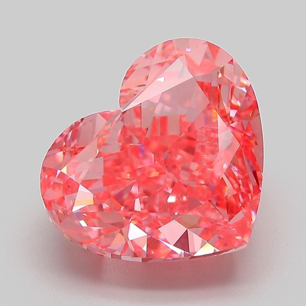 Loose Diamond - HEART 6.5ct Fancy Vivid Pink VS1: Loose Diamond - HEART 6.5ct Fancy Vivid Pink VS1 Source: This is a real non-mined Diamond that has been grown in a lab Shape: HEART Carats: 6.5 Color: Fancy Vivid Pink Certification: IGI Video: