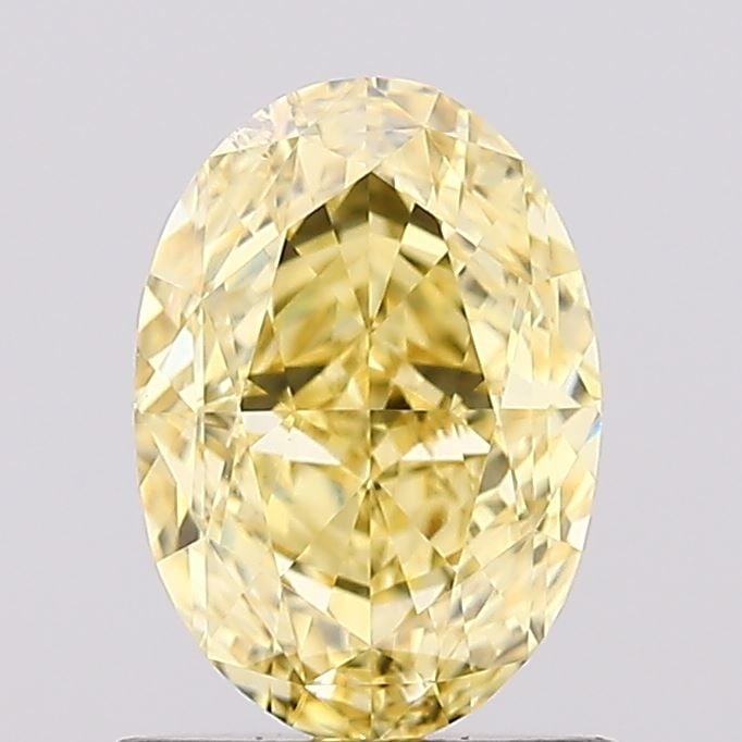 Loose Diamond - OVAL 1.04ct Fancy Vivid Yellow VS2: Loose Diamond - OVAL 1.04ct Fancy Vivid Yellow VS2 Source: This is a real non-mined Diamond that has been grown in a lab Shape: OVAL Carats: 1.04 Color: Fancy Vivid Yellow Certification: IGI Video: