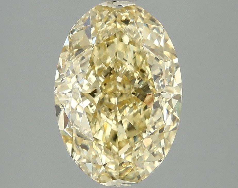 Loose Diamond - OVAL 3.1ct Fancy Vivid Yellow VS1: Loose Diamond - OVAL 3.1ct Fancy Vivid Yellow VS1 Source: This is a real non-mined Diamond that has been grown in a lab Shape: OVAL Carats: 3.1 Color: Fancy Vivid Yellow Certification: IGI Video: