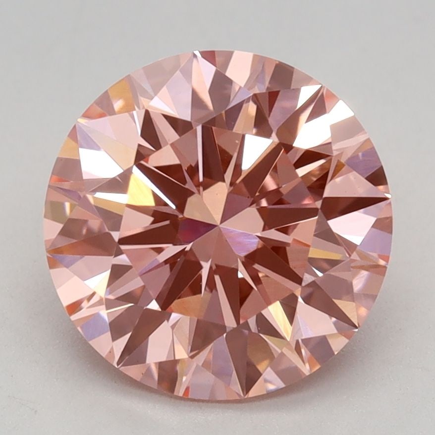 Ideal Loose Diamond - ROUND 2.15ct Fancy Vivid Pink VS1: Ideal Loose Diamond - ROUND 2.15ct Fancy Vivid Pink VS1 Source: This is a real non-mined Diamond that has been grown in a lab Shape: ROUND Carats: 2.15 Color: Fancy Vivid Pink Certification: IGI Video