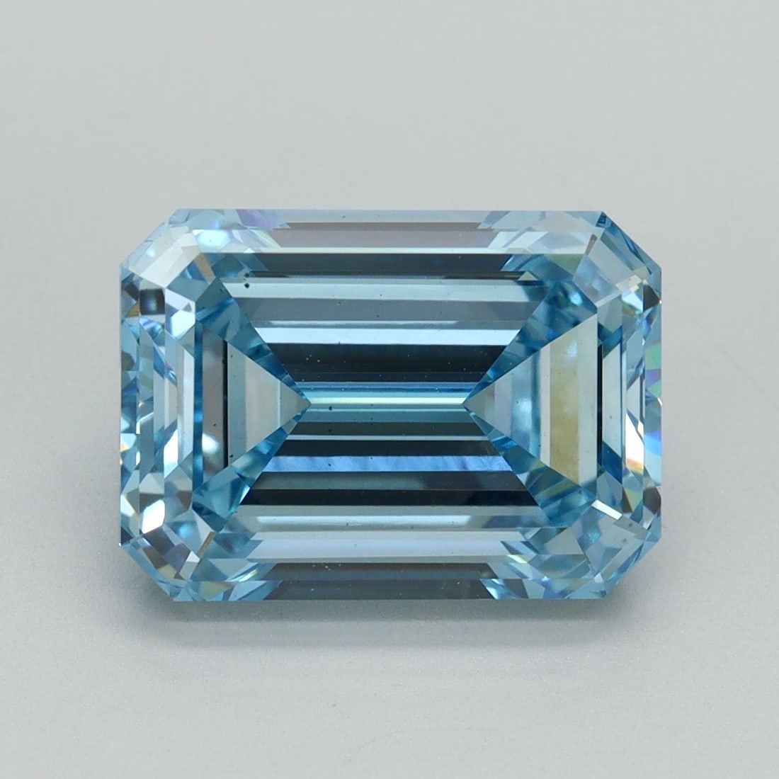 Loose Diamond - EMERALD 5.51ct Fancy Intense Blue VS2: Loose Diamond - EMERALD 5.51ct Fancy Intense Blue VS2 Source: This is a real non-mined Diamond that has been grown in a lab Shape: EMERALD Carats: 5.51 Color: Fancy Intense Blue Certification: IGI Vid