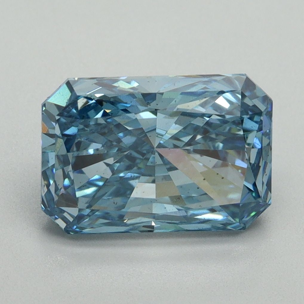 Loose Diamond - RADIANT 3.12ct Fancy Vivid Blue VS2: Loose Diamond - RADIANT 3.12ct Fancy Vivid Blue VS2 Source: This is a real non-mined Diamond that has been grown in a lab Shape: RADIANT Carats: 3.12 Color: Fancy Vivid Blue Certification: IGI Video: