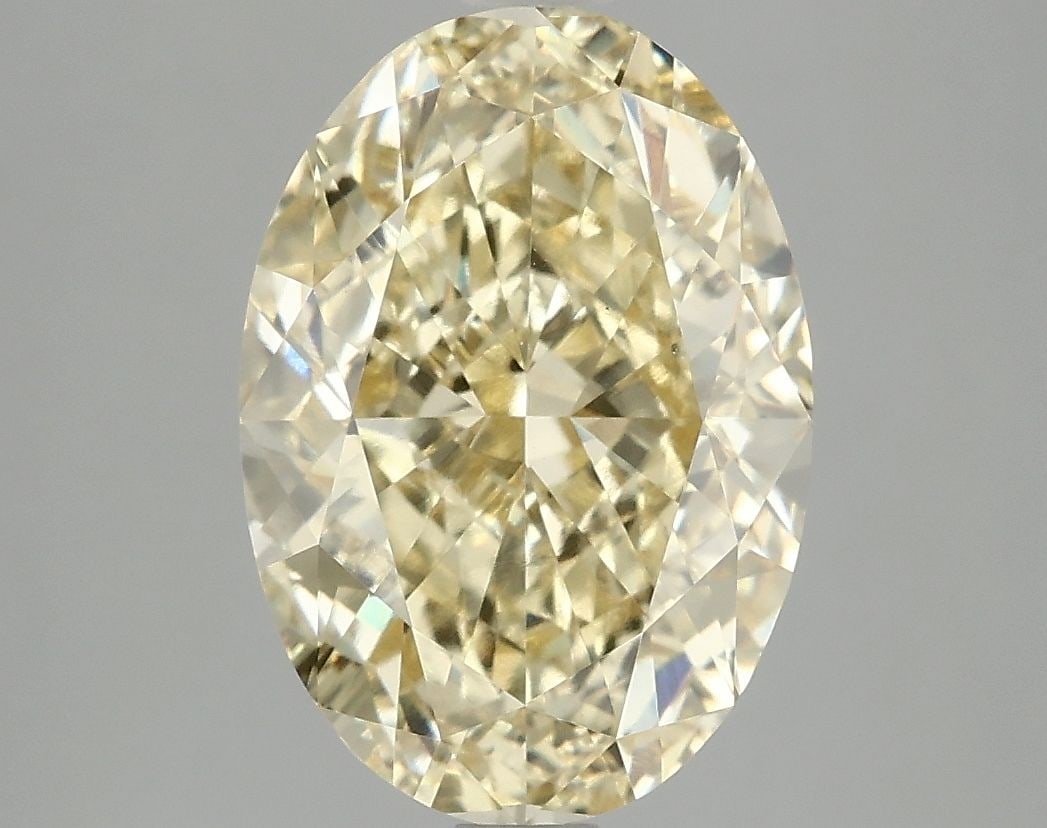Loose Diamond - OVAL 5.03ct Fancy Vivid Yellow VS1: Loose Diamond - OVAL 5.03ct Fancy Vivid Yellow VS1 Source: This is a real non-mined Diamond that has been grown in a lab Shape: OVAL Carats: 5.03 Color: Fancy Vivid Yellow Certification: IGI Video:
