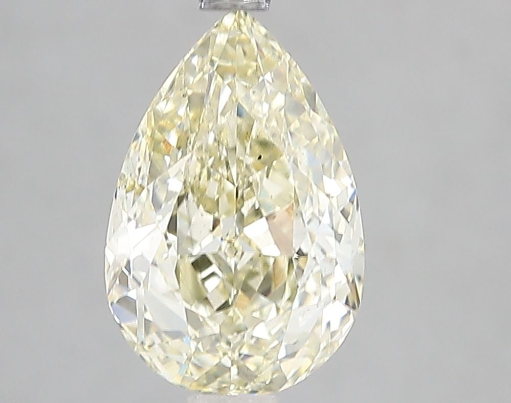 Loose Diamond - PEAR 2.5ct Fancy Light Yellow SI1: Loose Diamond - PEAR 2.5ct Fancy Light Yellow SI1 Source: This is a real non-mined Diamond that has been grown in a lab Shape: PEAR Carats: 2.5 Color: Fancy Light Yellow Certification: IGI Video: