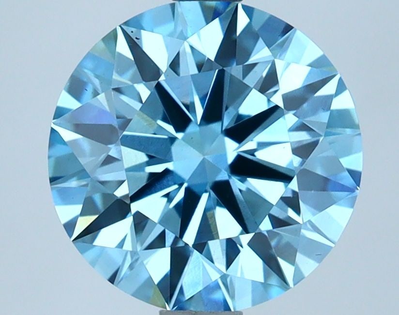 Ideal Loose Diamond - ROUND 2.65ct Fancy Vivid Blue VS1: Ideal Loose Diamond - ROUND 2.65ct Fancy Vivid Blue VS1 Source: This is a real non-mined Diamond that has been grown in a lab Shape: ROUND Carats: 2.65 Color: Fancy Vivid Blue Certification: IGI Video