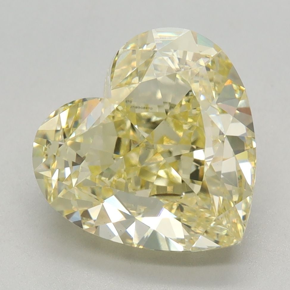 Loose Diamond - HEART 3.44ct Fancy Light Yellow VVS2: Loose Diamond - HEART 3.44ct Fancy Light Yellow VVS2 Source: This is a real non-mined Diamond that has been grown in a lab Shape: HEART Carats: 3.44 Color: Fancy Light Yellow Certification: IGI Video: