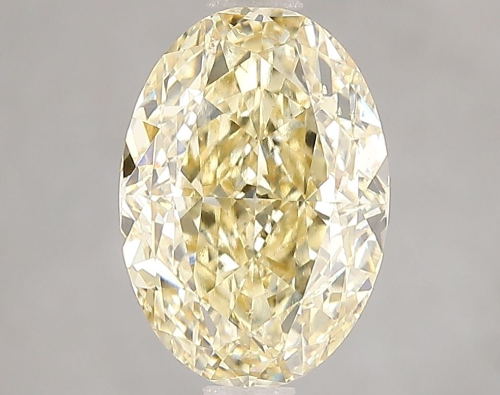 Loose Diamond - OVAL 3.01ct Fancy Intense Yellow VS2: Loose Diamond - OVAL 3.01ct Fancy Intense Yellow VS2 Source: This is a real non-mined Diamond that has been grown in a lab Shape: OVAL Carats: 3.01 Color: Fancy Intense Yellow Certification: IGI Video