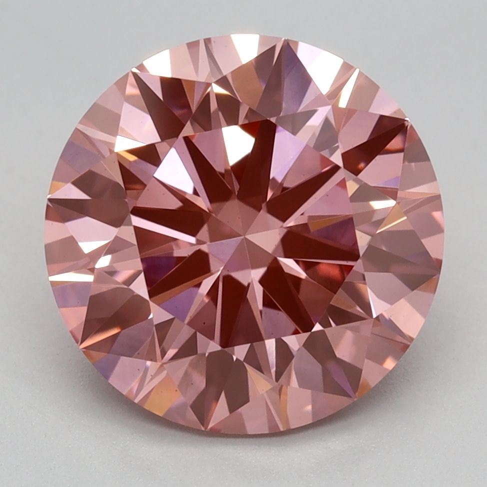 Ideal Loose Diamond - ROUND 3.08ct Fancy Vivid Pink VS1: Ideal Loose Diamond - ROUND 3.08ct Fancy Vivid Pink VS1 Source: This is a real non-mined Diamond that has been grown in a lab Shape: ROUND Carats: 3.08 Color: Fancy Vivid Pink Certification: IGI Video