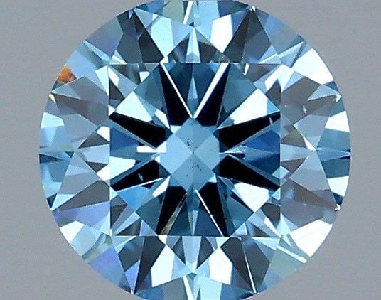 Ideal Loose Diamond - ROUND 1.0ct Fancy Vivid Blue VS2: Ideal Loose Diamond - ROUND 1.0ct Fancy Vivid Blue VS2 Source: This is a real non-mined Diamond that has been grown in a lab Shape: ROUND Carats: 1.0 Color: Fancy Vivid Blue Certification: IGI Video: