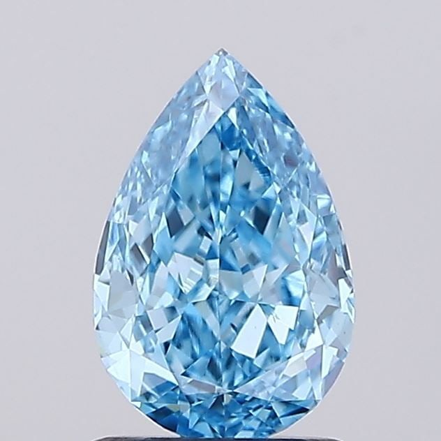 Loose Diamond - PEAR 1.01ct Fancy Vivid Blue VS1: Loose Diamond - PEAR 1.01ct Fancy Vivid Blue VS1 Source: This is a real non-mined Diamond that has been grown in a lab Shape: PEAR Carats: 1.01 Color: Fancy Vivid Blue Certification: IGI Video:
