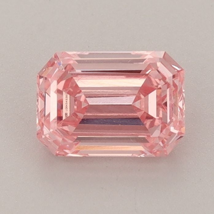 Loose Diamond - EMERALD 0.99ct Fancy Vivid Pink VS2: Loose Diamond - EMERALD 0.99ct Fancy Vivid Pink VS2 Source: This is a real non-mined Diamond that has been grown in a lab Shape: EMERALD Carats: 0.99 Color: Fancy Vivid Pink Certification: IGI Video: