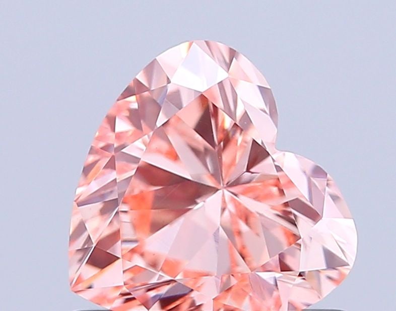 Loose Diamond - HEART 0.74ct Fancy Vivid Pink VVS2: Loose Diamond - HEART 0.74ct Fancy Vivid Pink VVS2 Source: This is a real non-mined Diamond that has been grown in a lab Shape: HEART Carats: 0.74 Color: Fancy Vivid Pink Certification: IGI Video:
