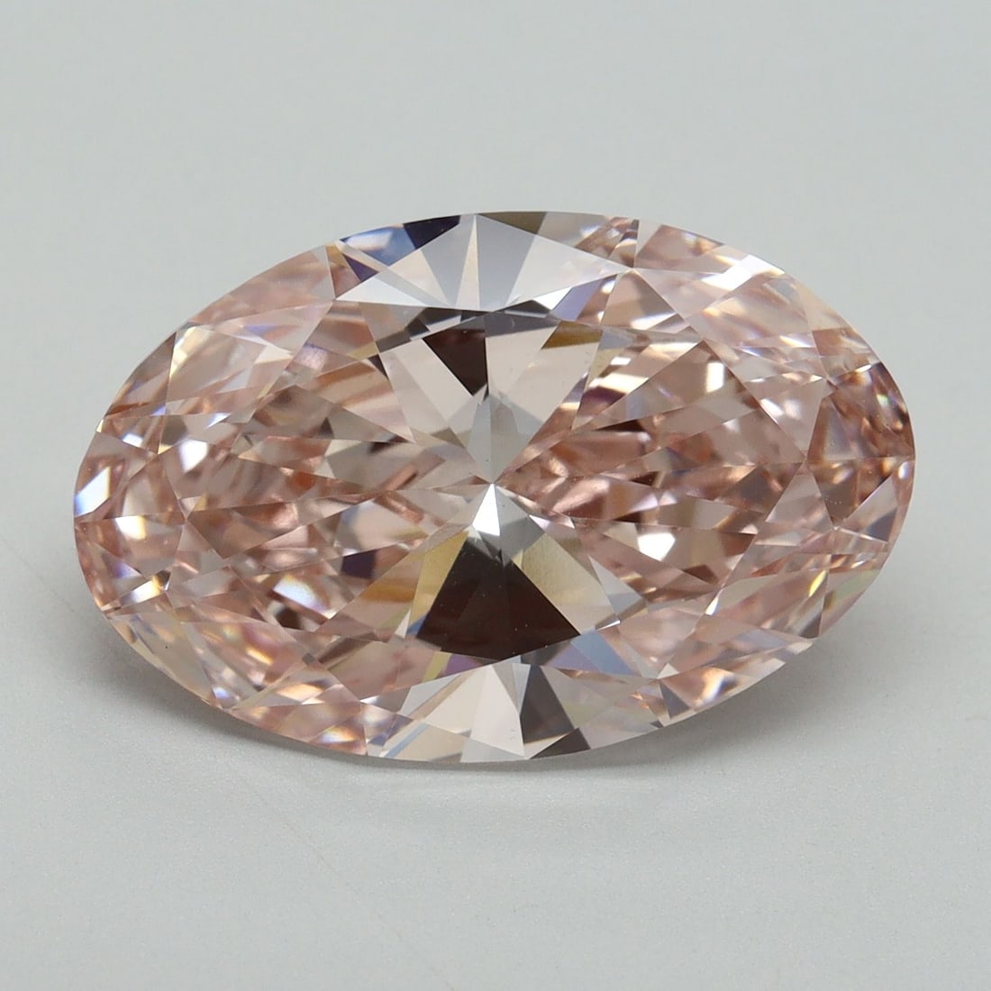 Loose Diamond - OVAL 7.03ct Fancy Vivid Pink VS1: Loose Diamond - OVAL 7.03ct Fancy Vivid Pink VS1 Source: This is a real non-mined Diamond that has been grown in a lab Shape: OVAL Carats: 7.03 Color: Fancy Vivid Pink Certification: IGI Video: