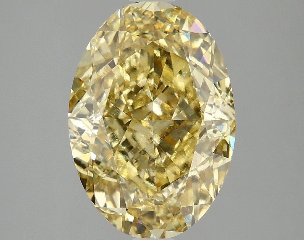 Loose Diamond - OVAL 4.05ct Fancy Vivid Yellow VS1: Loose Diamond - OVAL 4.05ct Fancy Vivid Yellow VS1 Source: This is a real non-mined Diamond that has been grown in a lab Shape: OVAL Carats: 4.05 Color: Fancy Vivid Yellow Certification: IGI Video: