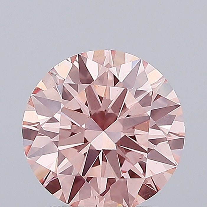 Loose Diamond - ROUND 2.05ct Fancy Intense Pink VS2: Loose Diamond - ROUND 2.05ct Fancy Intense Pink VS2 Source: This is a real non-mined Diamond that has been grown in a lab Shape: ROUND Carats: 2.05 Color: Fancy Intense Pink Certification: IGI Video:
