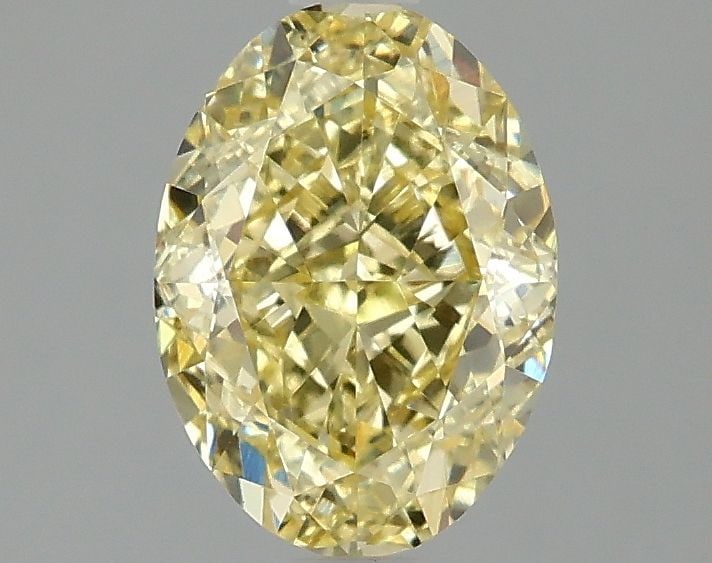 Loose Diamond - OVAL 1.59ct Fancy Intense Yellow VS1: Loose Diamond - OVAL 1.59ct Fancy Intense Yellow VS1 Source: This is a real non-mined Diamond that has been grown in a lab Shape: OVAL Carats: 1.59 Color: Fancy Intense Yellow Certification: IGI Video
