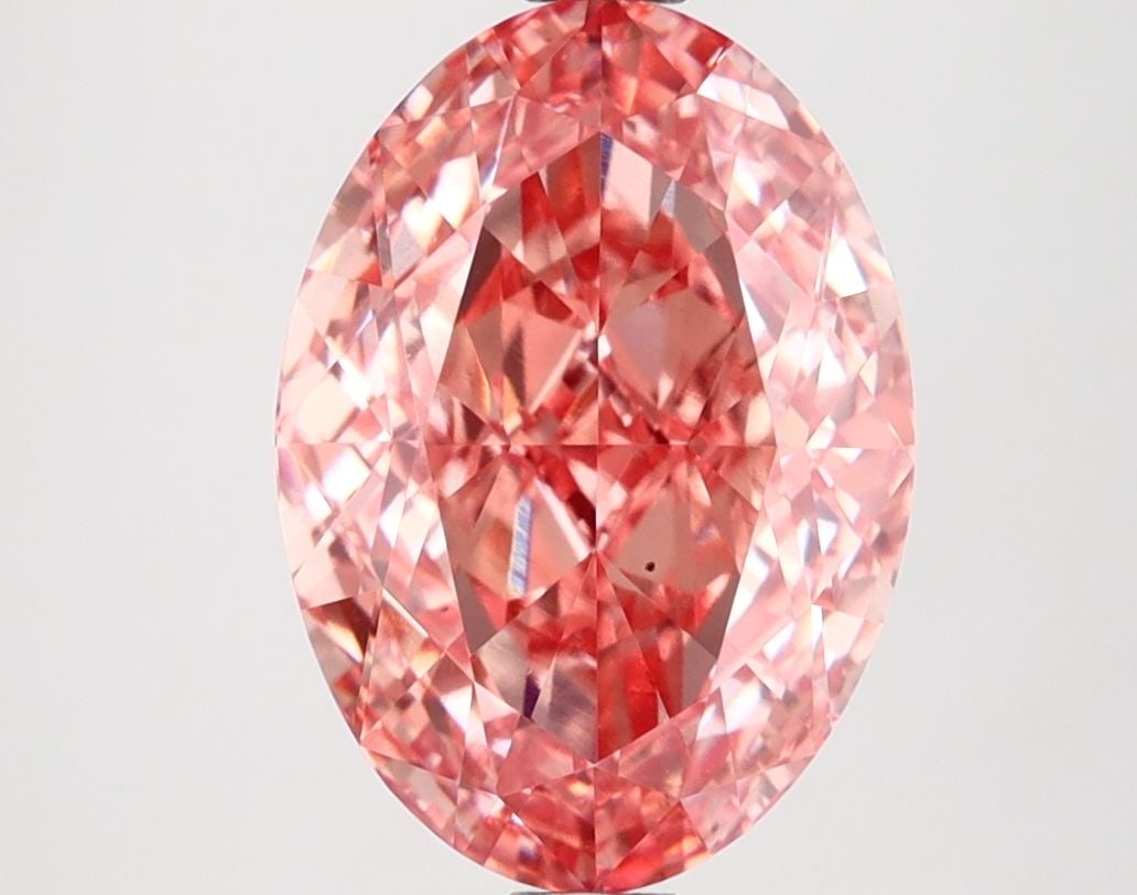 Loose Diamond - OVAL 3.22ct Fancy Vivid Orangey Pink VS1: Loose Diamond - OVAL 3.22ct Fancy Vivid Orangey Pink VS1 Source: This is a real non-mined Diamond that has been grown in a lab Shape: OVAL Carats: 3.22 Color: Fancy Vivid Orangey Pink Certification: I