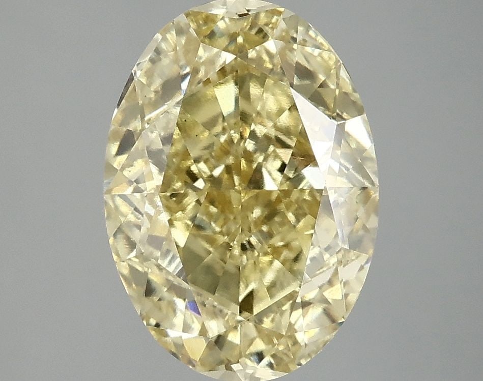 Loose Diamond - OVAL 4.02ct Fancy Vivid Yellow VS1: Loose Diamond - OVAL 4.02ct Fancy Vivid Yellow VS1 Source: This is a real non-mined Diamond that has been grown in a lab Shape: OVAL Carats: 4.02 Color: Fancy Vivid Yellow Certification: IGI Video: