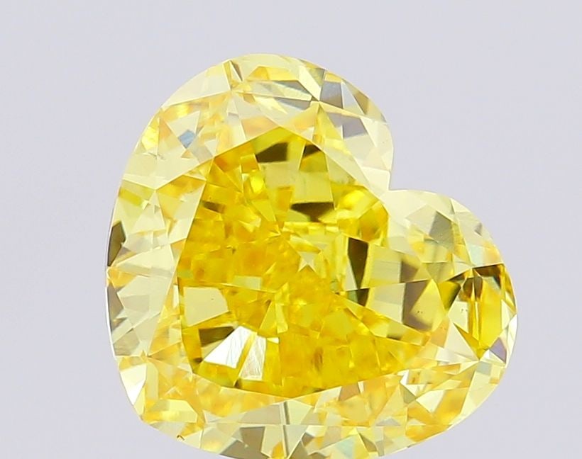 Loose Diamond - HEART 6.58ct Fancy Vivid Yellow VS1: Loose Diamond - HEART 6.58ct Fancy Vivid Yellow VS1 Source: This is a real non-mined Diamond that has been grown in a lab Shape: HEART Carats: 6.58 Color: Fancy Vivid Yellow Certification: IGI Video: